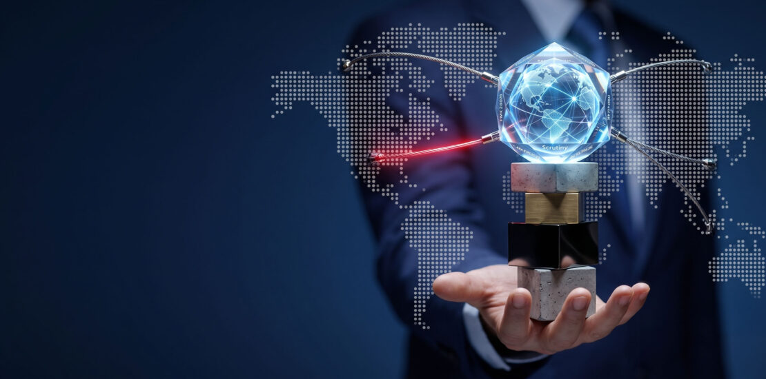 A businessman's hand balancing a crystal globe and taut network wires on a stack of concrete and metal blocks, symbolizing the high stakes and strict scrutiny of transfer pricing structures under PMK 28/2026.